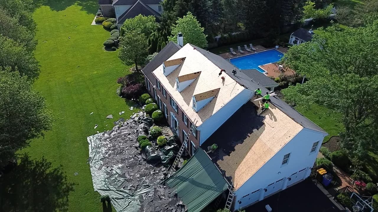 Emergency roof repair team arriving in Center City Philadelphia