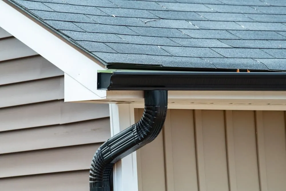 Professional downspout installation and repair services by licensed contractors