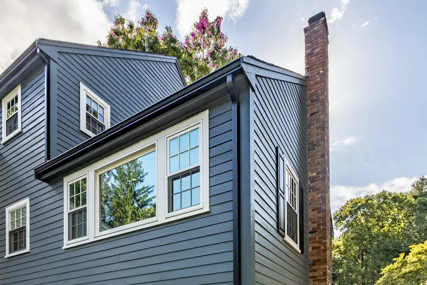 Professional gutter repair preventing water damage to home foundation
