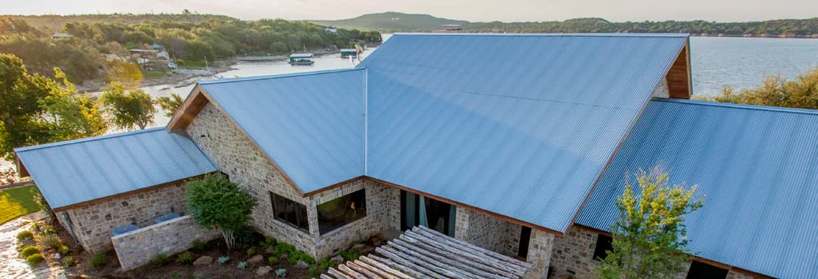 Installation of corrugated metal roofing panels