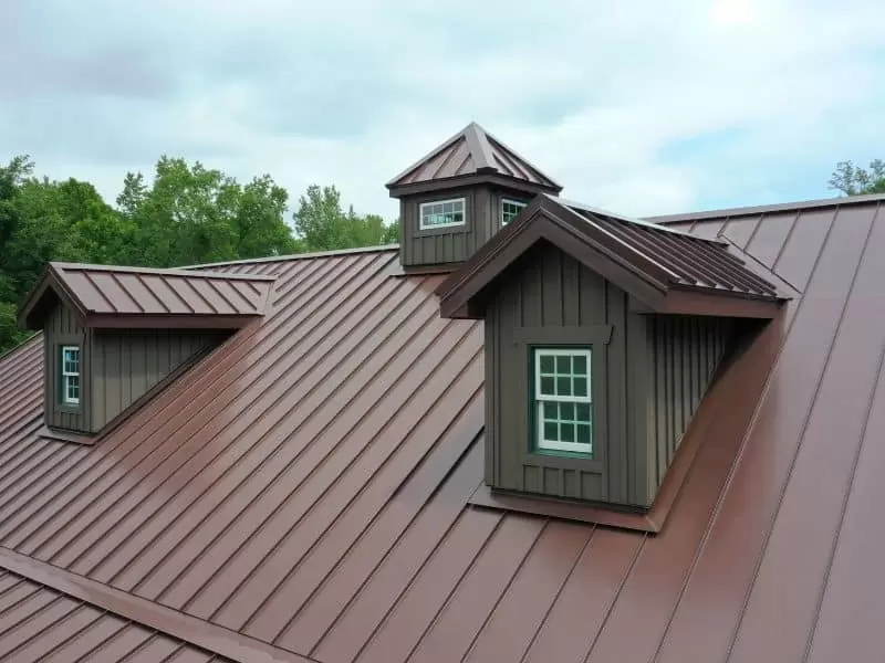 Close-up of professional metal roof patch repair work