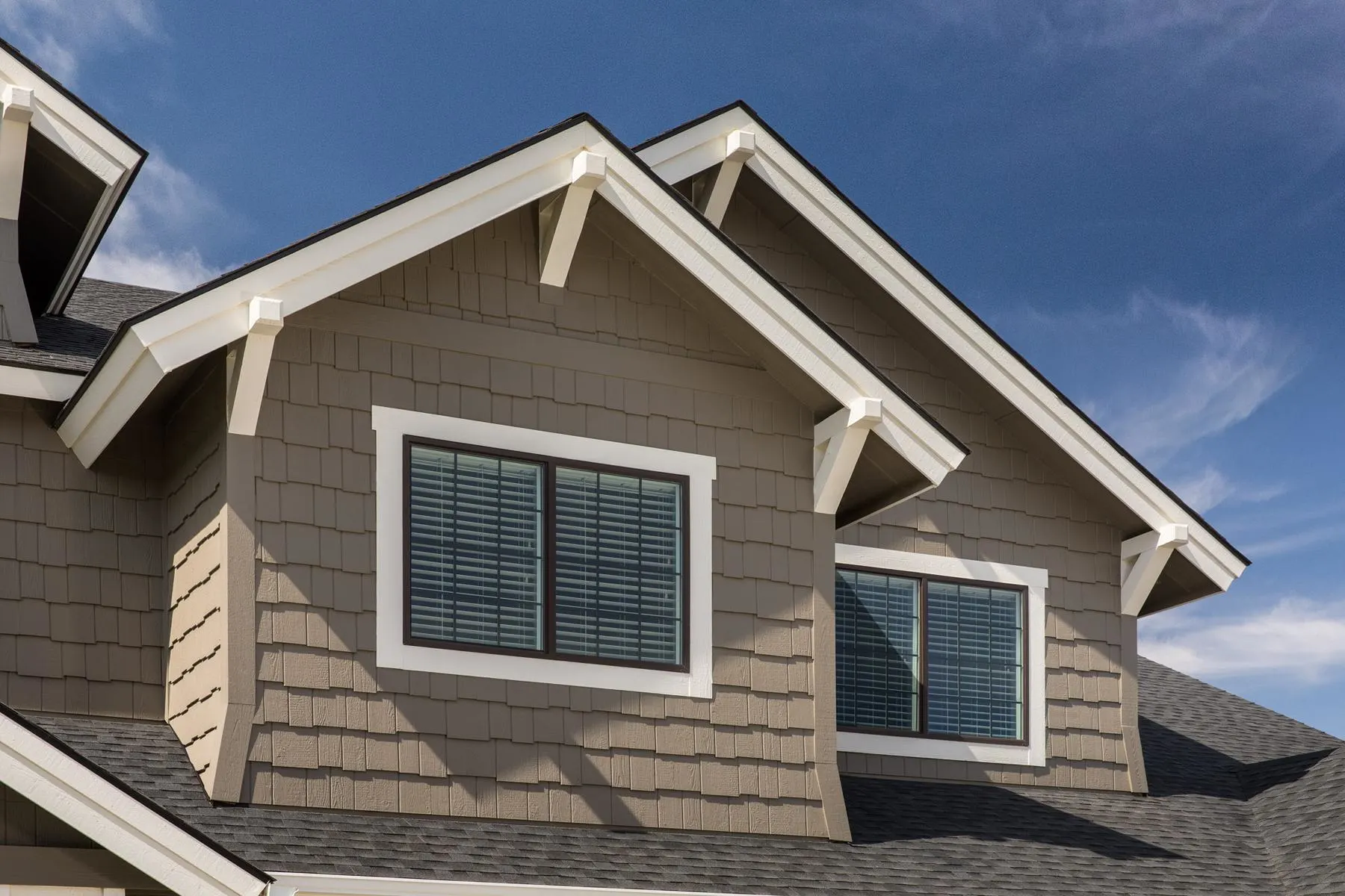 Vertical siding installation on modern home