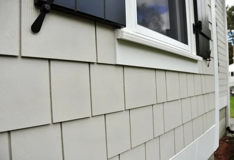 Close-up of fiber cement siding installation showing superior craftsmanship
