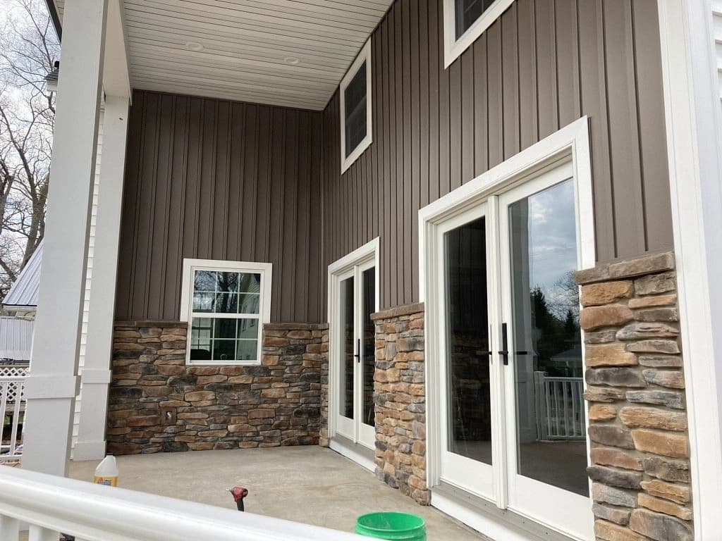 Professional siding repair demonstration