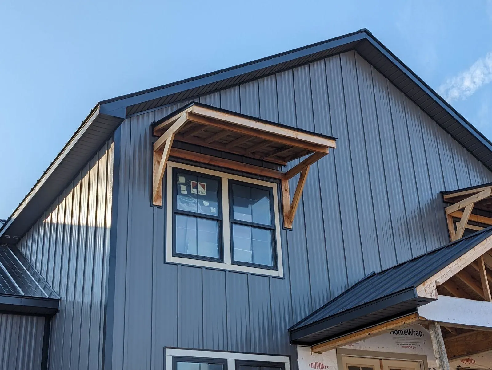 Metal board and batten siding on a modern home