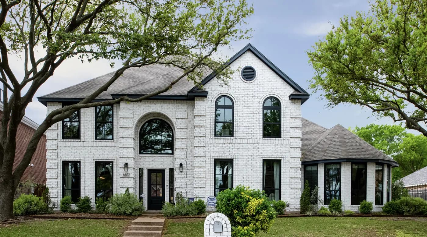 Professional round top window installation by Paragon Exterior