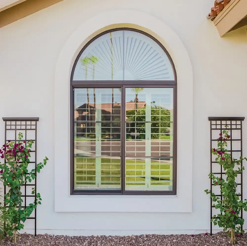 Round top windows professionally installed on home